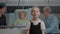 Portrait of young child standing in hospital ward at clinic