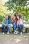 Portrait of young college students in park