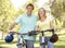 Portrait Of Young Couple On Bike Ride