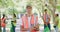 Portrait of a young environmental NGO employees at a park cleaning project. A group of volunteers wearing uniform