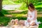 Portrait of a young expectant mother at a picnic