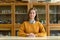 Portrait of young female college student in chemistry class. Focused student in classroom.