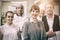 Portrait of young female manager posing in modern kitchen