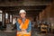 Portrait of young foreman with hard hat
