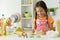 Portrait of young girl baking in the kitchen