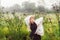 Portrait of young girl dancing in chamomile field