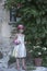 Portrait of a young girl in floral dress in Provence