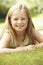 Portrait Of Young Girl Relaxing In Countryside