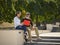 Portrait of young girl sitting with grandfather at park