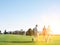 Portrait of young golfers walking on the golf course