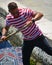 Portrait of young Gondolier with the typical shirt with red and white stripes,