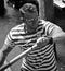 Portrait of young Gondolier with the typical shirt with red and white stripes,