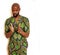 Portrait of young handsome african man wearing bright green national costume smiling gesturing, entertainment stuff