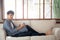Portrait young handsome asian man napping relax with cozy on sofa at home