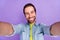 Portrait of young handsome cheerful male take selfie record video vlog freelancer isolated on violet color background