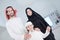 Portrait of young happy arabian muslim family