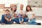 Portrait of young happy family with pretty teenager daughter and