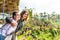 Portrait of young and happy romantic couple in balinese nature. Bali island.