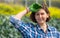 portrait of a young and hardworking woman working on the field