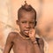 Portrait of a young Himba boy, Epupa falls, Namibia