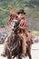 Portrait Of A Young Hispanic Cowboy Throwing A Lasso