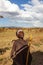 Portrait of young maasai boy after ceremony with white face paint