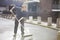 Portrait of young male street sweeper