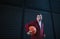 Portrait of young man with down syndrom holding basketball ball.