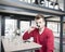 Portrait of young man drinking espresso in cafe