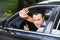 Portrait of young man driving car