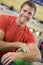 Portrait of a young man holding a bowling ball