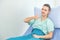 Portrait young man patient lying in hospital bed and pose thumb up with nice smile confident in the treatments process