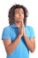 Portrait of young man praying against white background