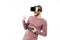 Portrait of young man standing in virtual reality glasses with joystick in hand and showing yes gesture on white