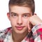 Portrait of a young man, he is wearing checkered pattern shirt