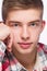 Portrait of a young man, he is wearing checkered pattern shirt