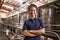 Portrait of young mixed race woman working at a wine factory