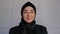 Portrait Young Muslim woman in hijab smiling happy enjoying successful urban lifestyle. Traditional Islamic culture and