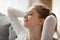 Portrait of young positive woman relaxing at home