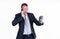 Portrait of young screaming businessman posing with four smartphones isolated over white wall background. Too many calls in one