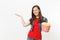 Portrait of young smiling pretty woman in casual clothes watching movie film, holding bucket of popcorn, pointing hand