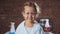 Portrait of a young smiling scientist child girl in a chemistry lab.