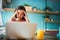 Portrait young stressed displeased worried business woman sitting in front of laptop