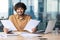 Portrait of young successful financier businessman paper work, hispanic smiling and looking at camera man holding paper