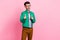 Portrait of young successful guy blinking pointing fingers you well done everything cool isolated on pink color