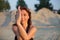 portrait of a young woman doing eagle yoga pose