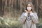 portrait of young woman in a face protective mask- girl with stethoscope around the neck-image of beautiful lady