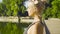 Portrait of young woman meditating near the lake