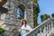 Portrait of young woman in mediterranean gardens. American gardens park in Opatija, Croatia