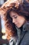 Portrait of young woman with natural curly hair